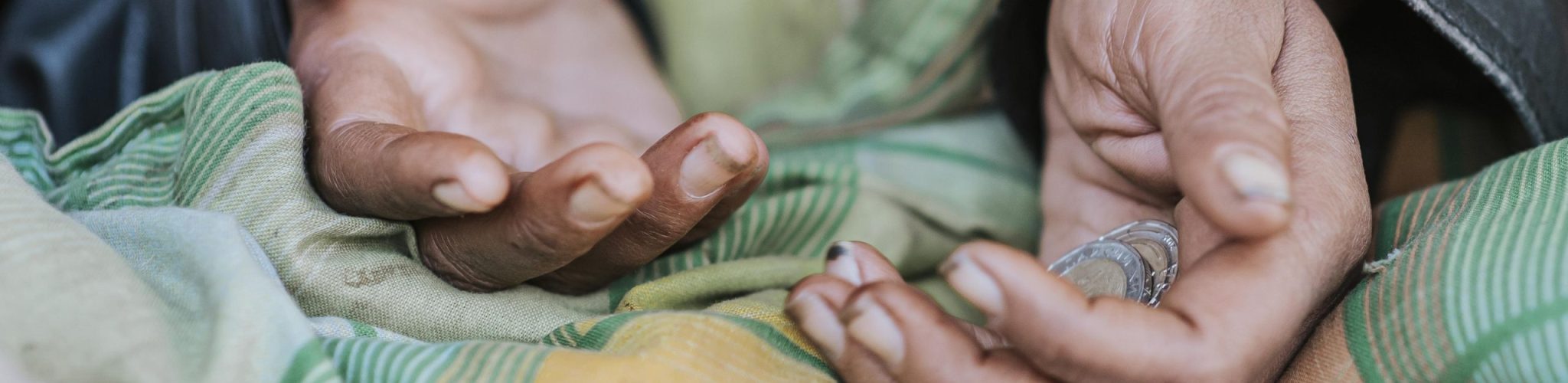 homeless-woman-holding-hands-out-help